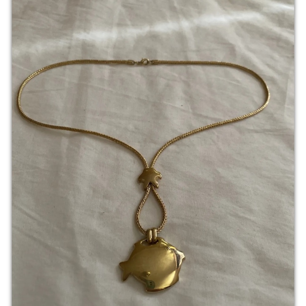 Gold tone fish pendant necklace